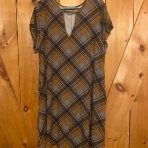 Plaid fall mini dress with peek a boo neck